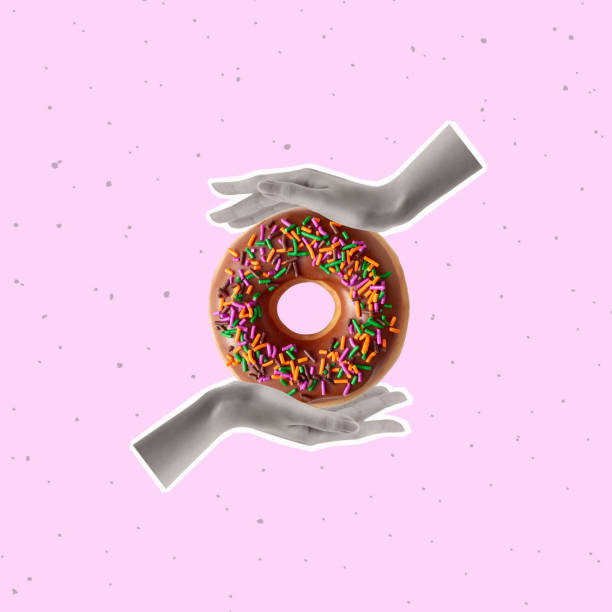 istock Contemporary art collage of hands holding a donut. 1472955285