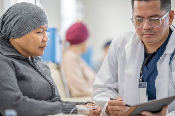 istock Cancer Patient Talking with the Doctor 1472955884