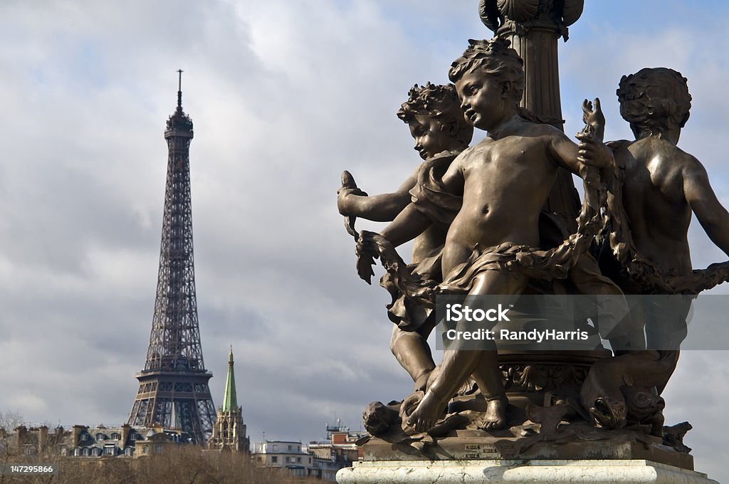 Eiffel Tower and Pont Alexander III Eiffel Tower and  lamp post detials on Pont Alexander III. 2009 Stock Photo