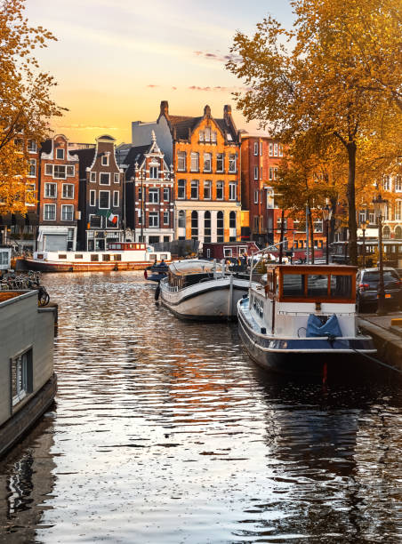 istock Amsterdam Netherlands dancing houses over river Amstel landmark 1472959229