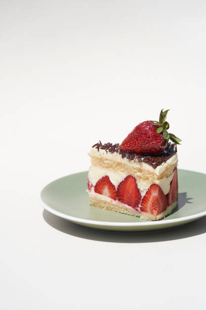 istock Strawberry cheesecake dessert on white background 1472961762