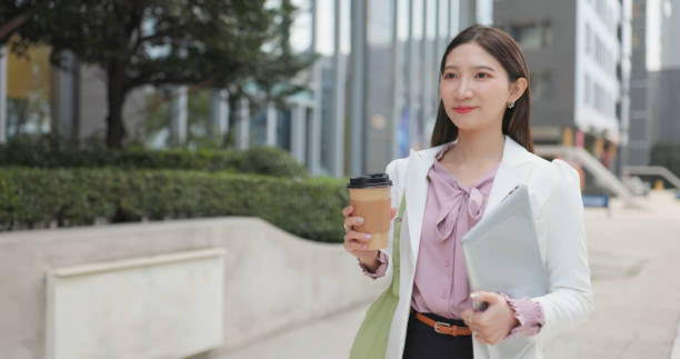 istock business woman commuting 1472965894