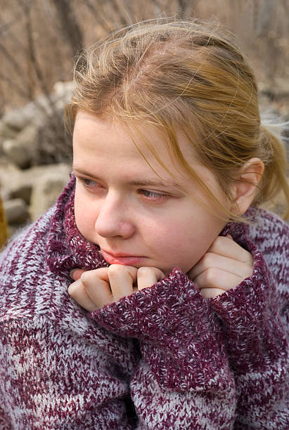 istock Girl in Sweater 147296984