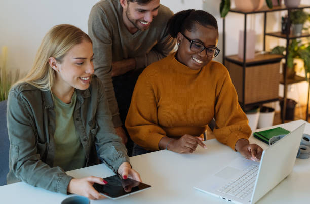 istock Team of young diverse entrepreneurs working together 1472976885