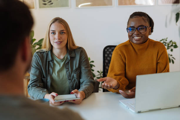 istock Team of young diverse entrepreneurs working together 1472977190