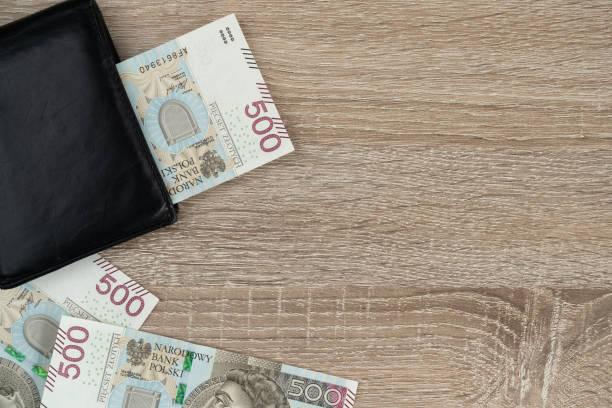 istock 500 Polish zloty banknotes, wallet and copy space. 1472978102