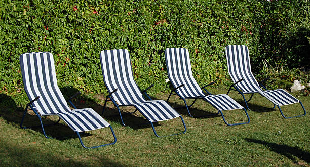 Deck Chairs in the garden stock photo