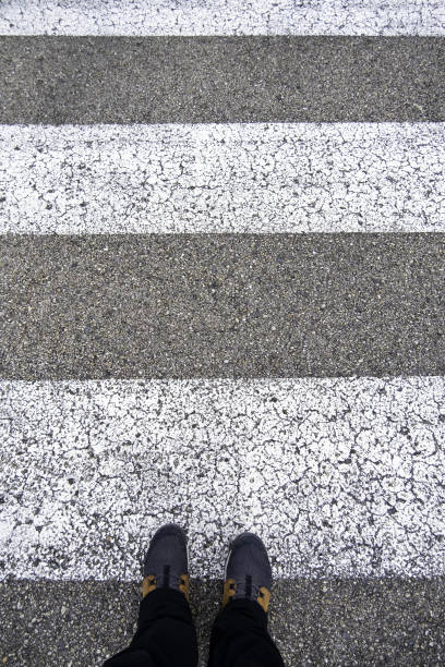 istock Old pedestrian crossing on the asphalt 1472978515