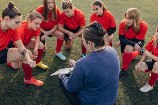 istock Female rugby team on time out 1472983572