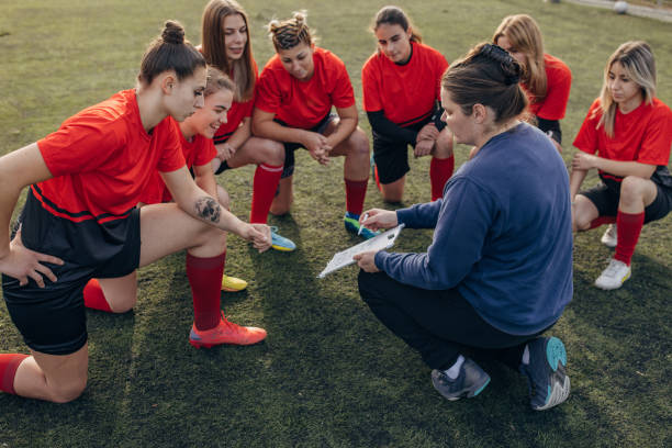 istock Female rugby team on time out 1472983620