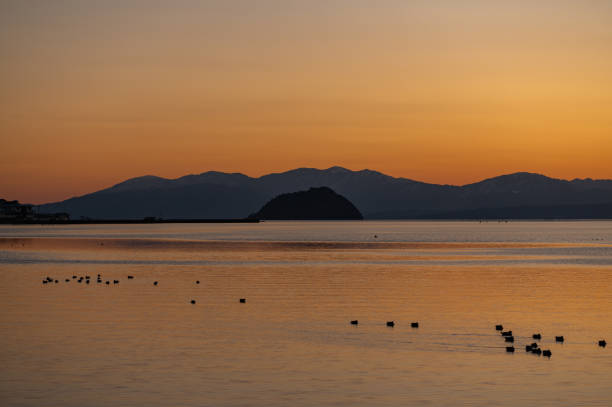istock beautiful sunset on the lake 1472983711