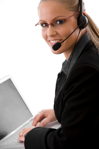 Young woman working as call center representative.