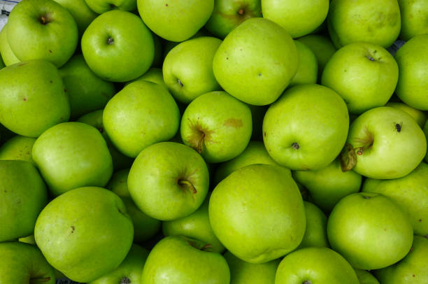 istock Green apples at rural market 1472989641