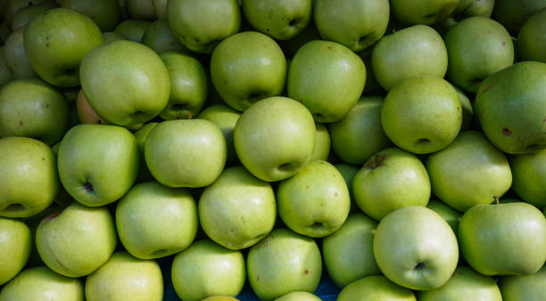 istock Green apples at rural market 1472989760