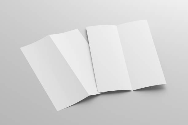 istock Half-folded flyer A4 vertical booklet mock up on white background. Side view 1472992305