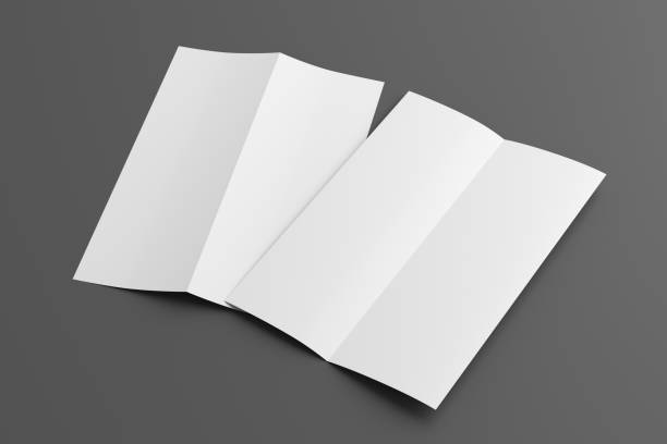 istock Half-folded flyer A4 vertical booklet mock up on gray background. Side view 1472992386