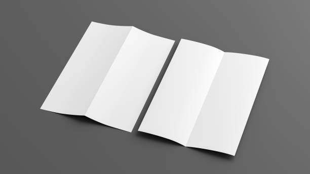 istock Half-folded flyer A4 vertical booklet mock up on gray background. Side view 1472992452