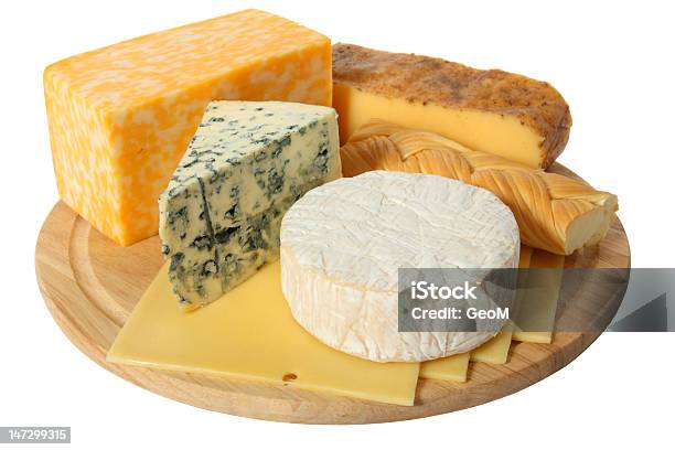 Variety Of Cheese Being Served On A Wooden Platter Stock Photo - Download Image Now - Blue, Breakfast, Brie