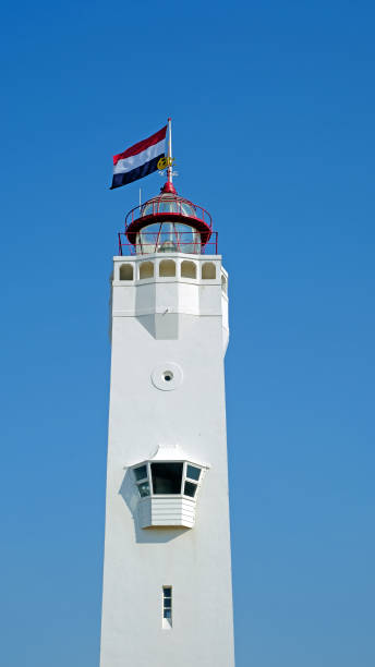 istock Lighthouse from Noordwijk aan Zee in the Netherlands 1472993705