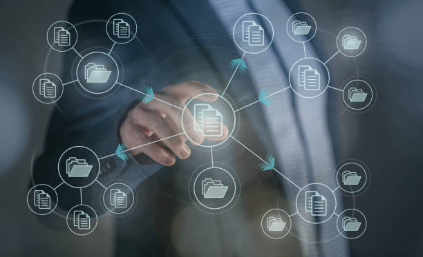 istock Standing businessman archiving document directory on cloud Business setup document management system 1472993764