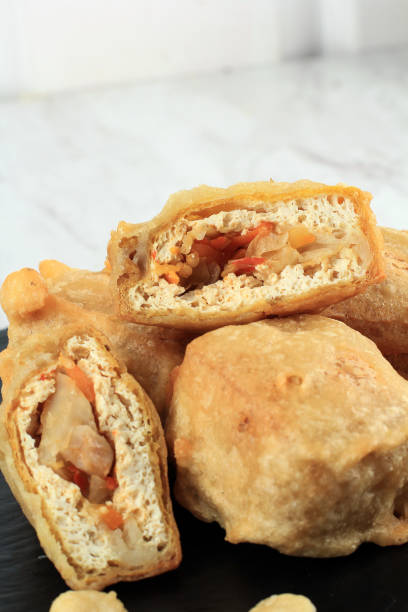 istock Gehu Pedas, Deep Fried Stuffed White Tofu with Chopped Mix Vegetables 1472994050