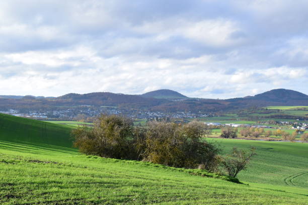 istock Eifel landscape with volcano hills 1472996212