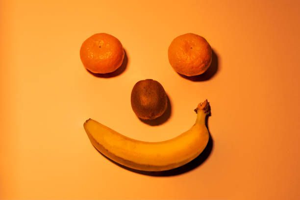istock tangerines, a kiwi and a banana 1472996461