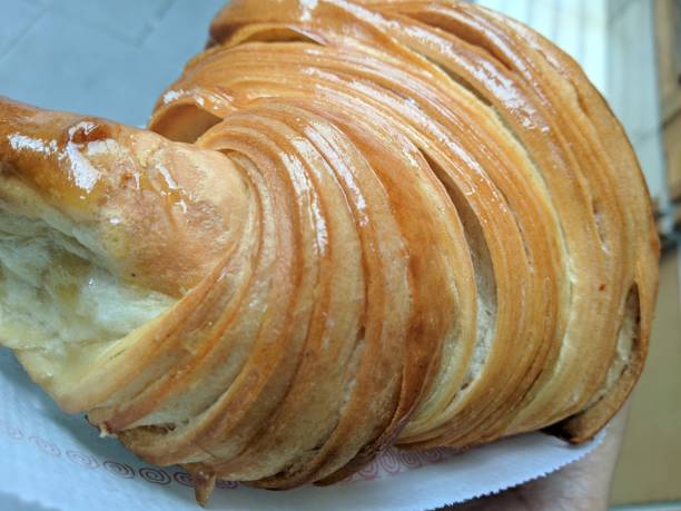 istock Delicious breakfast with fresh croissants and coffee 1472998571
