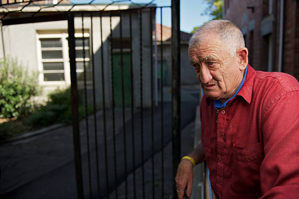 istock Man with a disability outside an old building 147299900