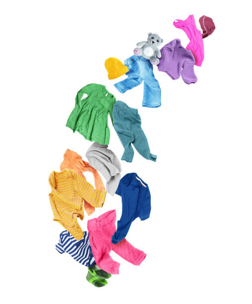 istock Colored baby clothes in the air isolated on a white background 1473001415