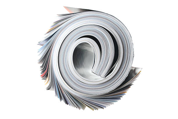 magazine rolled magazine isolated on white rolled up magazine stock pictures, royalty-free photos & images