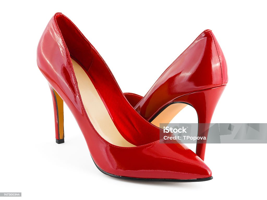 Rosso con tacco alto scarpe su sfondo bianco - Foto stock royalty-free di Rosso