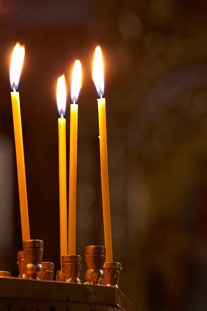 istock candles in church 147300502