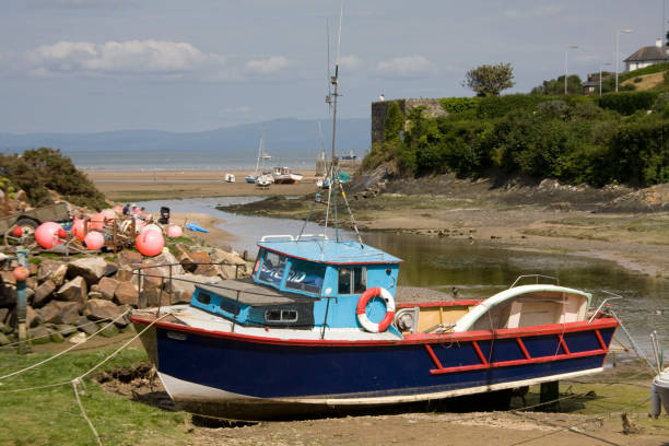 istock Boat at low tide on Anglesey, Wales 1473005100
