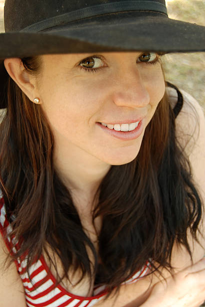 istock Country girl in a hat 147300699