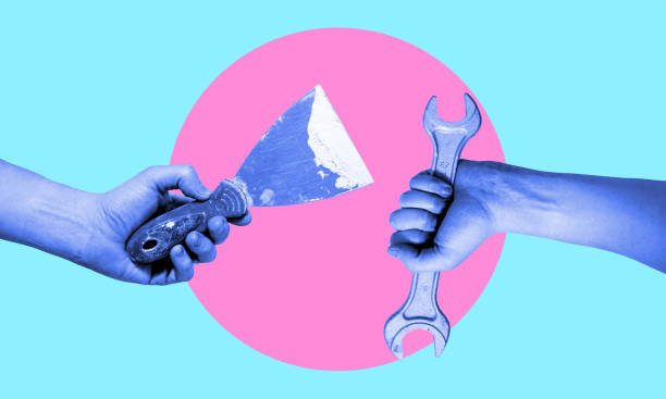 istock Art collage. Two hands outstretched to each other with tools. 1473009996