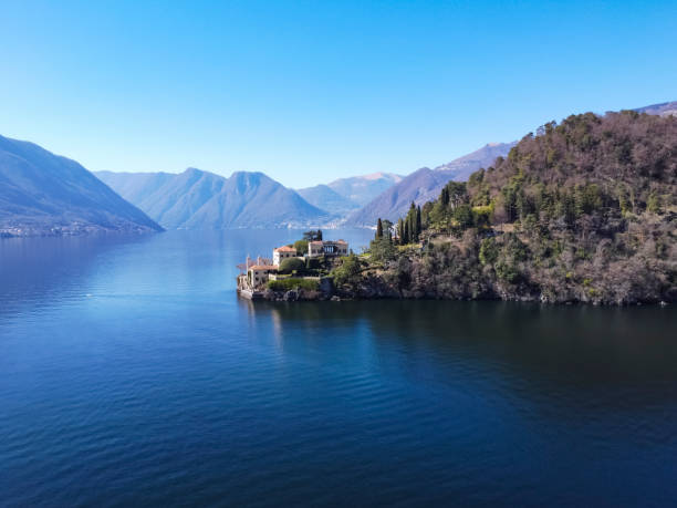 Aerial view of Villa Balbianello peninsula on Lake Como Aerial view of Villa Balbianello peninsula on Lake Como lake como stock pictures, royalty-free photos & images