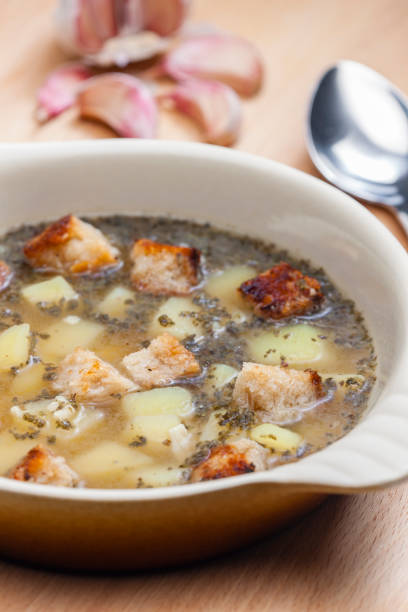 istock garlic soup with toasted bread and potatoes 1473012108