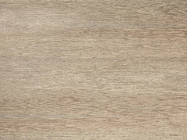 sfondo da un pannello laminato che imita la vecchia quercia sbiancata con una struttura longitudinale - particle plank wood brown foto e immagini stock