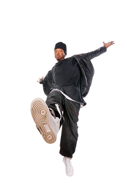 Hip-hop dancer balancing on one leg stock photo