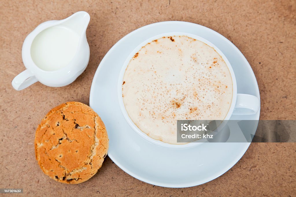 coffee with milk coffee with milk and biscuit on old surface Biscuit - Quick Bread Stock Photo