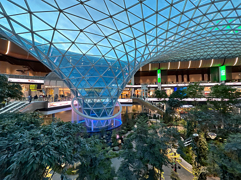 Doha, Qatar - February 10, 2023: Hamad International Airport (DOH) expands with indoor tropical garden.