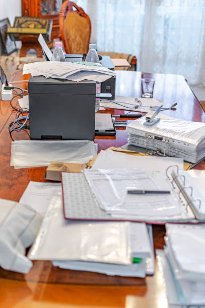 home office full of messy paperwork - document file emotional stress paperwork imagens e fotografias de stock