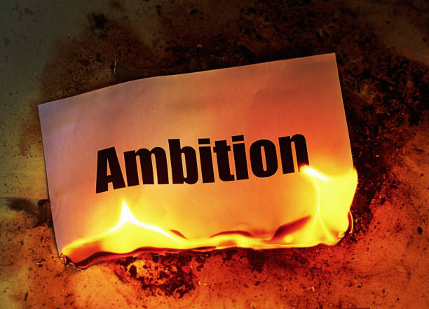 istock Burning ambition: the word goes up in flames, 1473019544