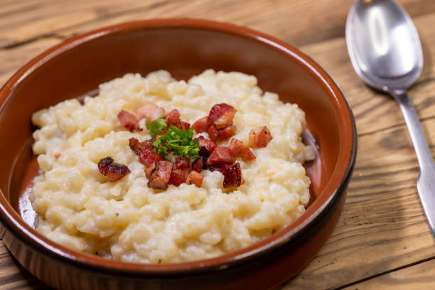 istock Slovakian halusky served with sheep cheese and roasted bacon 1473021217