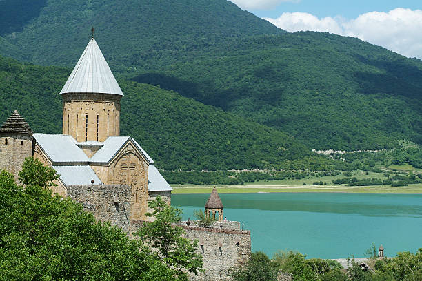 Ancient monastery near lake Tskhinvali, South Ossetia stock photo