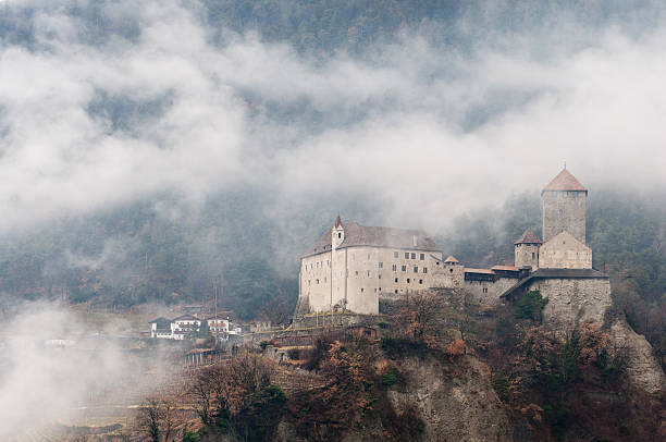 istock Italian castle in the fog 147302171