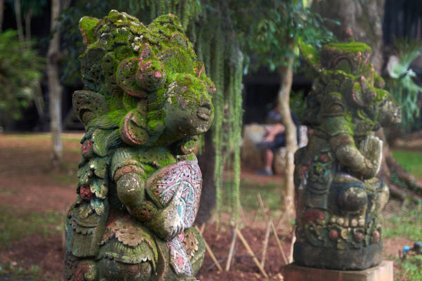 istock Moss covered woman headed God Statue a 1473023515