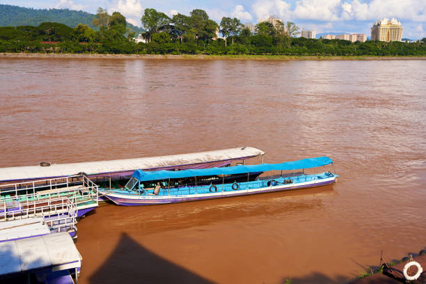 landscape of the Mekong River at the confluence of three countries, known as the Golden Triangle.