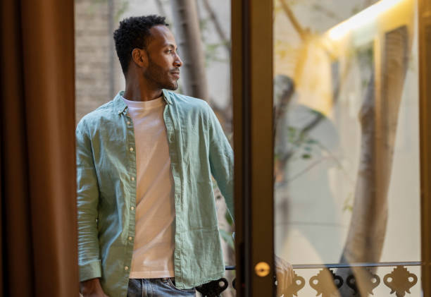 african american man on balcony at home